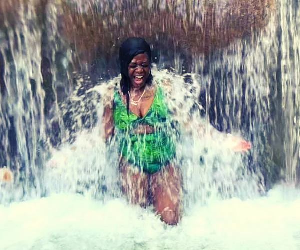The waterfall is located in a park in Ocho Rios (Dunns River Falls Jamaica)